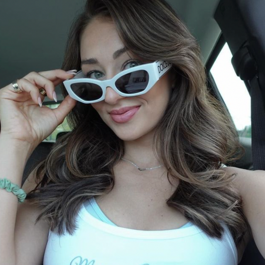 Dallas Cowboy Cheerleader rents bridal accessories from Borrow Me Bridal